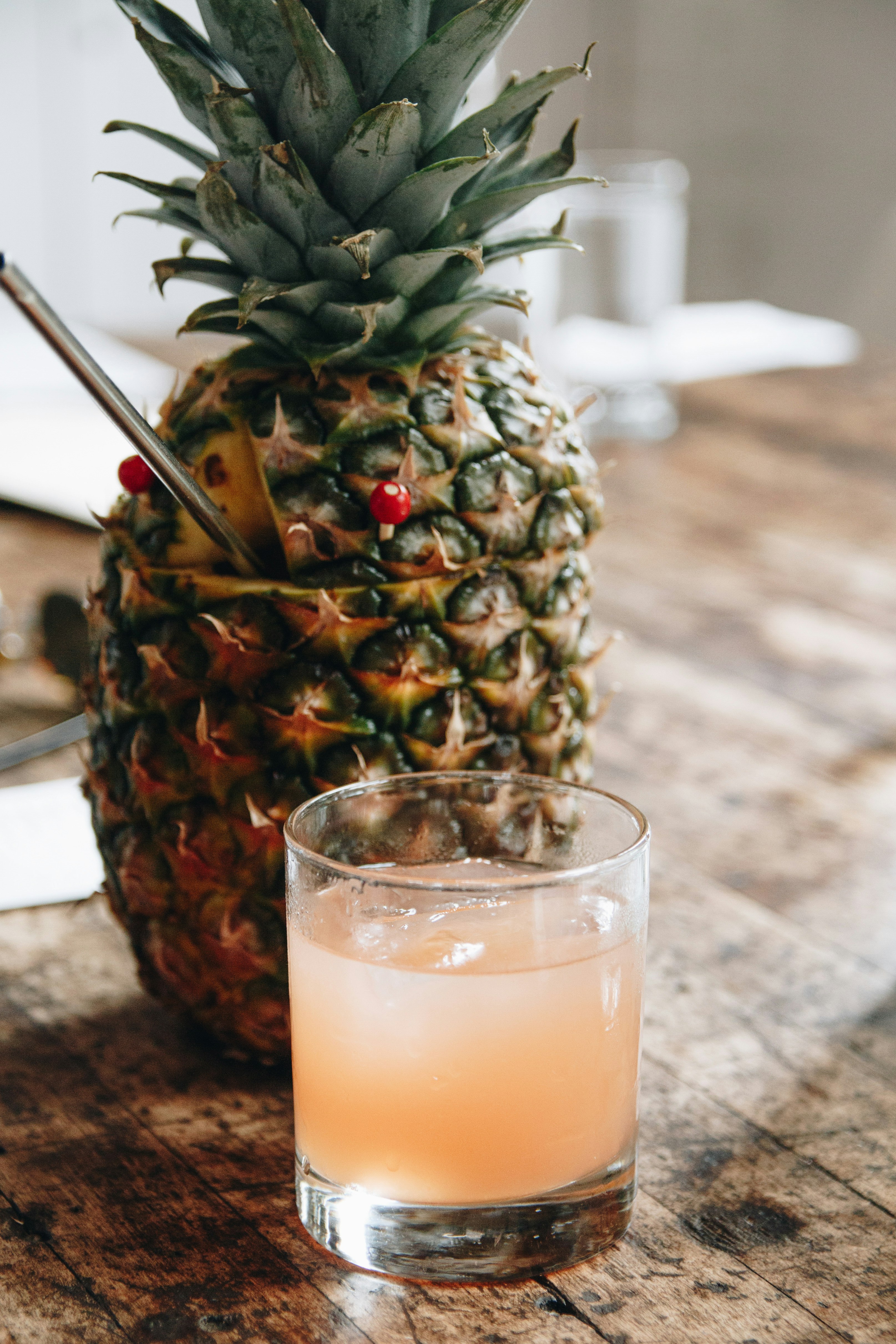 pineapple juice in clear drinking glass